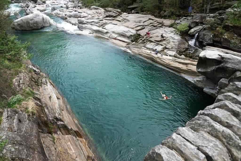 Wild swimming Quarry deep green pool