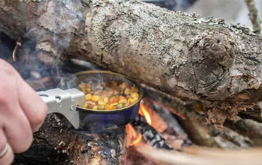 Small Pan or Pot Lid Cooking on Open Fire