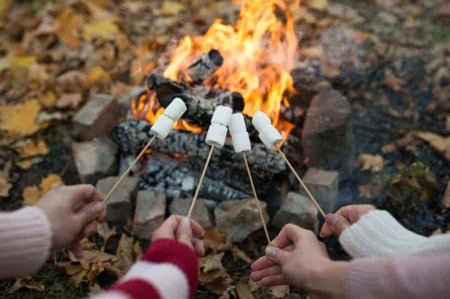 campfire fun with friends outside tent