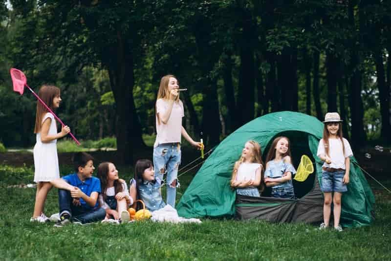 kids enjoying a camping holiday